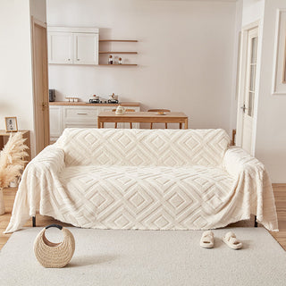 Fleece sofa throw, Ecru quilted diamond, draped over a sofa