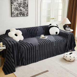 Chenille sofa throw, Grey bouclé, draped over a sofa