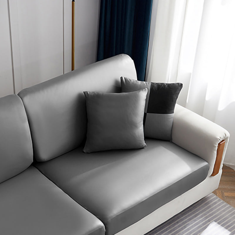 Faux leather cushion cover 40 × 40 cm (16 in), single, Pebble grey, fitted on a sofa