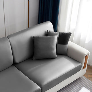 Faux leather cushion cover 40 × 40 cm (16 in), single, Pebble grey, fitted on a sofa