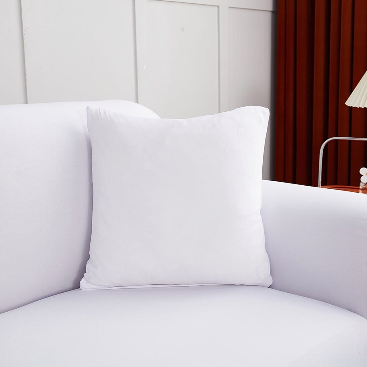 Stretch cushion covers 45 × 45 cm (18 in), pack of 2, White, fitted on a sofa