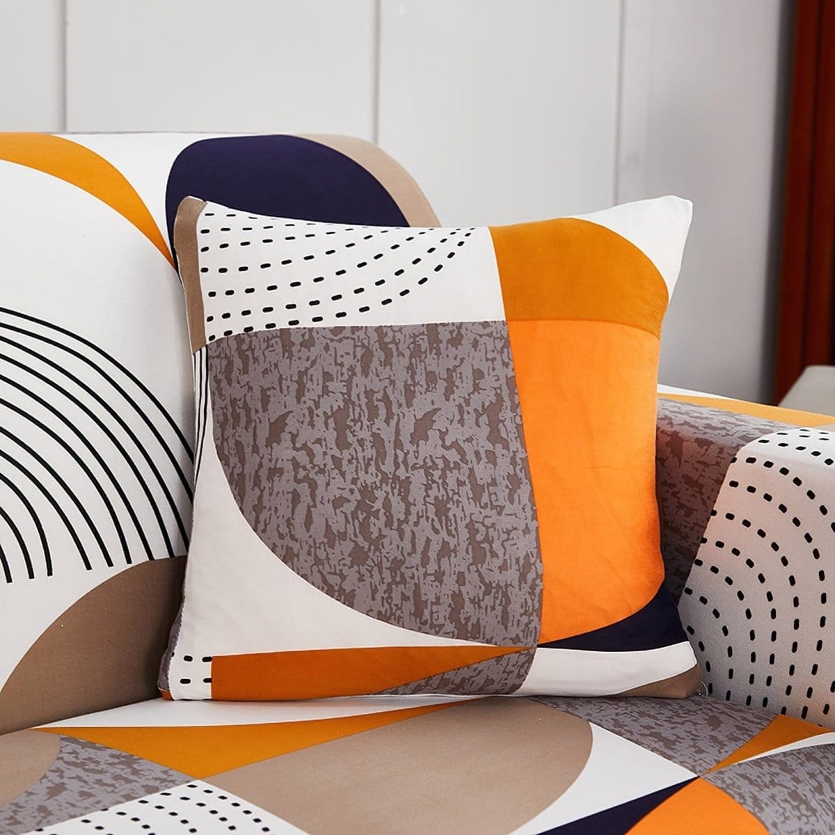 Stretch cushion covers 45 × 45 cm (18 in), pack of 2, Orange and black patchwork, fitted on a sofa